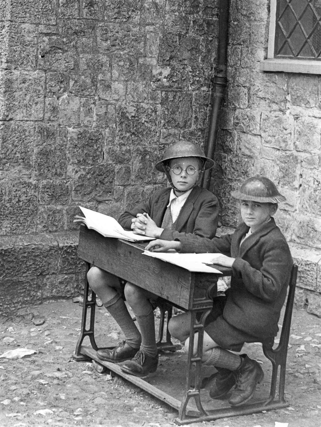 Children joined in Doodlebug spotting duty. Gordon Spendley and Alan Chapman, did lessons while keeping an eye open outside Otham School. undated file pic. used in "Recalling the Battle of Britain" book by HRPB page 39. Negative Reference: no details (10436227)