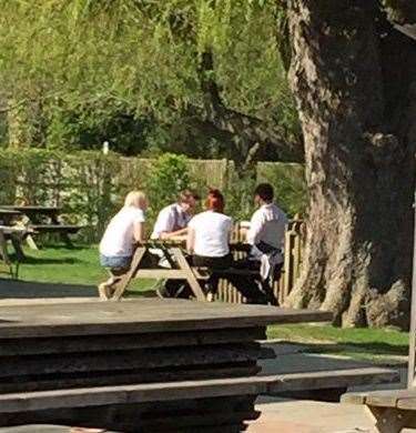 Staff pictured outside the Milk House in Sissinghurst on Friday