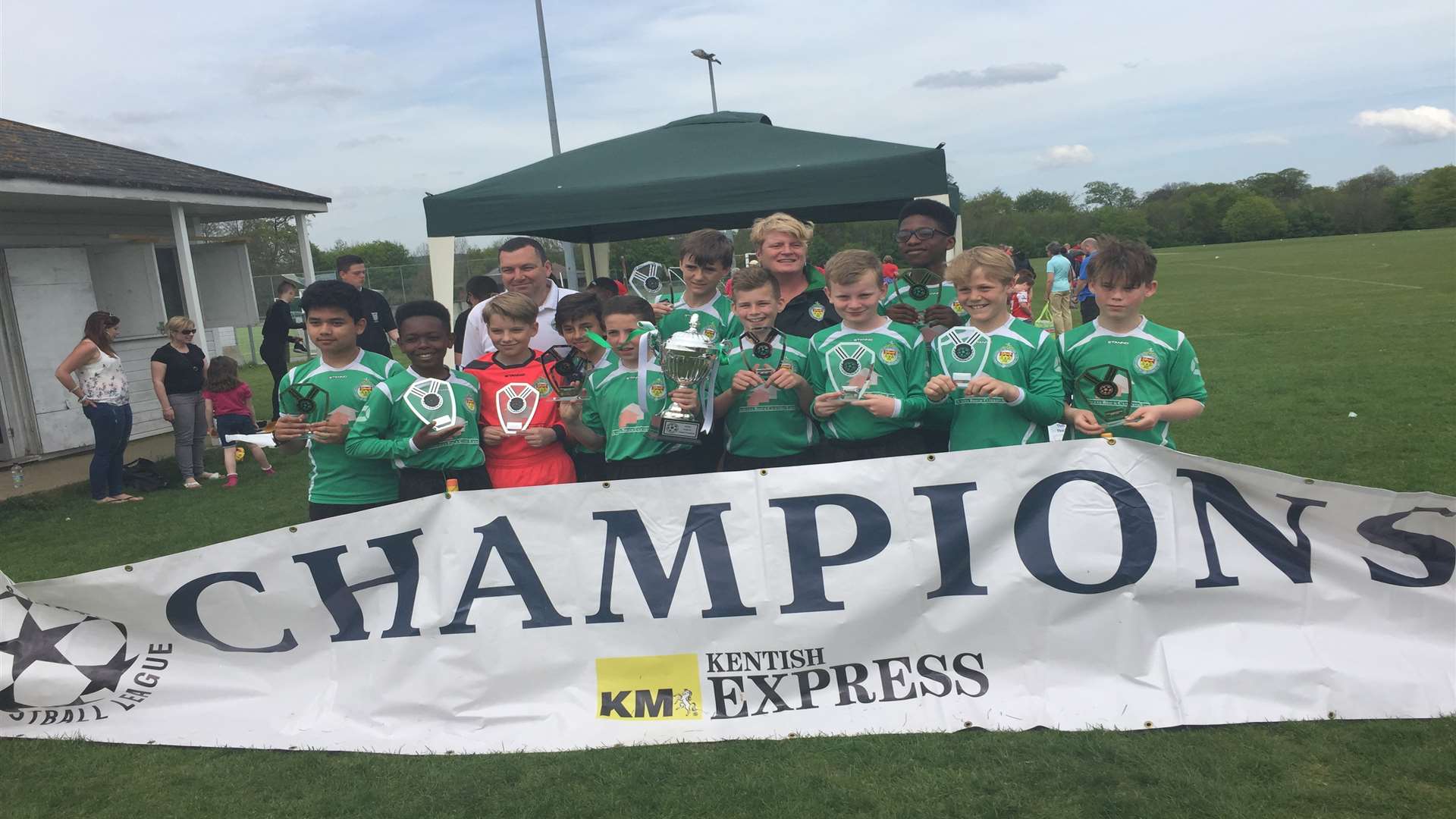 The Ashford United under 12s celebrate their league title win. Players: Ewomazino Akporehe, Charlie Dixon, Liam Daly, Declan McDonald (Connor's brother), Enea Shehaj, Lucas Goronga, Leyton Hall, Aryan Pariyar, Miles Mason, Rowan Shardlow, Jamie Betts, Jasper Benson, Freddie Grist.