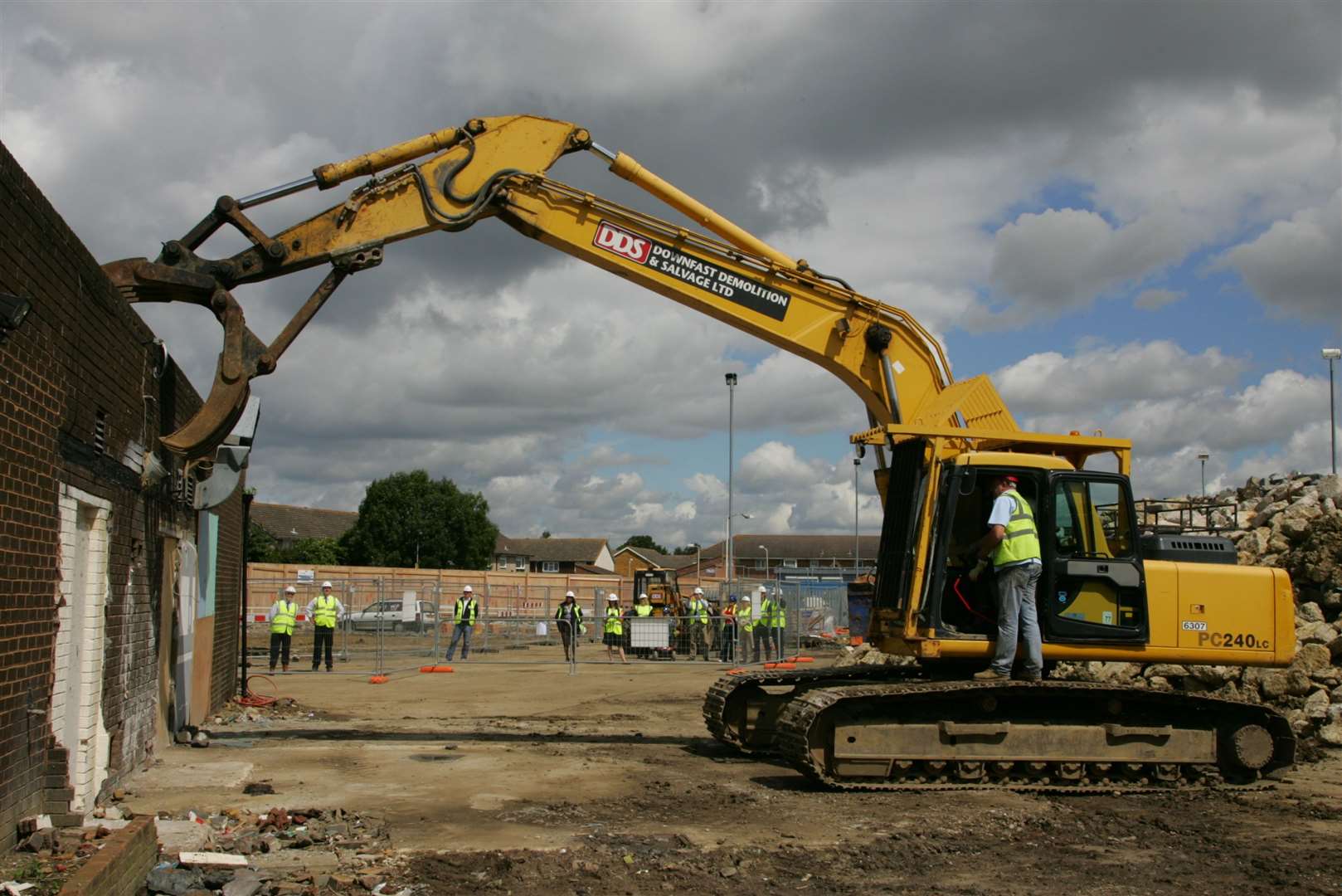 Mrs Laughton was in the cab of the excavator, controlling the vehicle as it started knocking down The Nelson pub in 2007