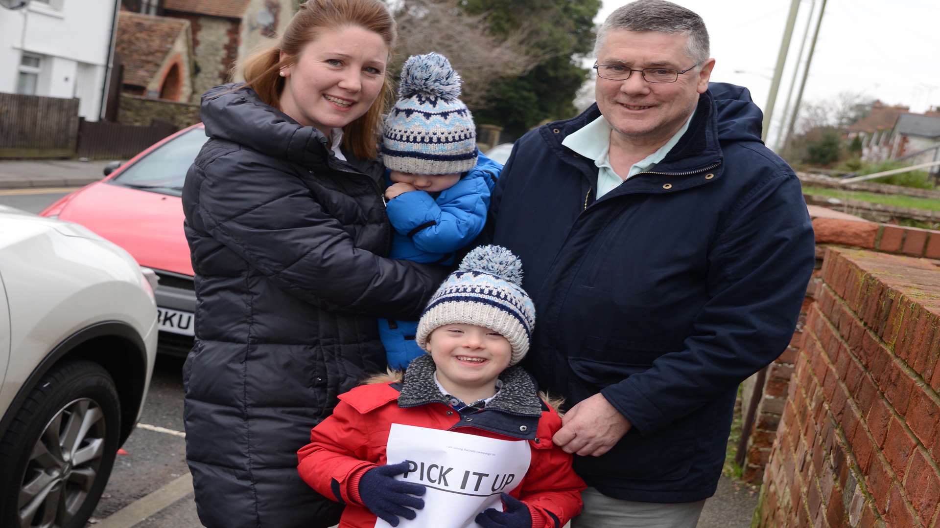 Rachel Thomas with Hugo, six, Pierce, nine months, and her dad Tim Davison. Picture: Gary Browne