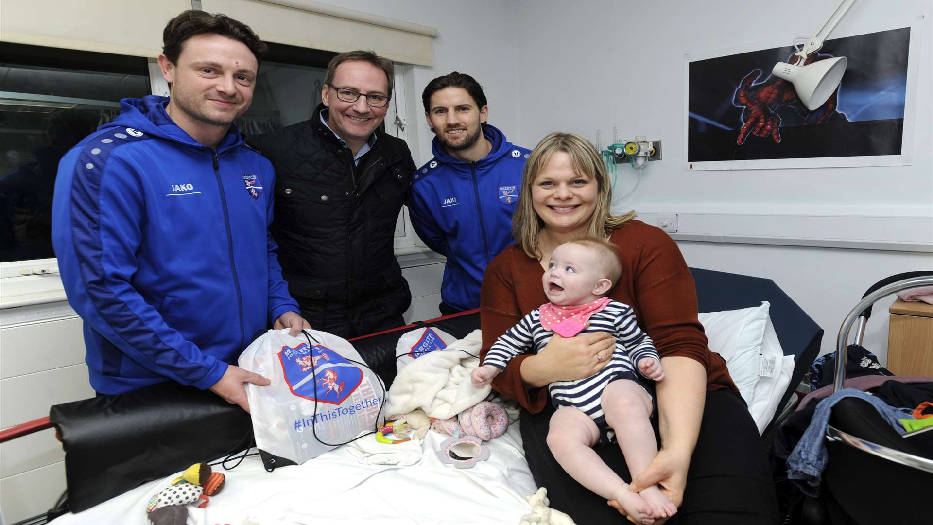 Margate chairman Alistair Bayliss and players Frannie Collin and James Rogers