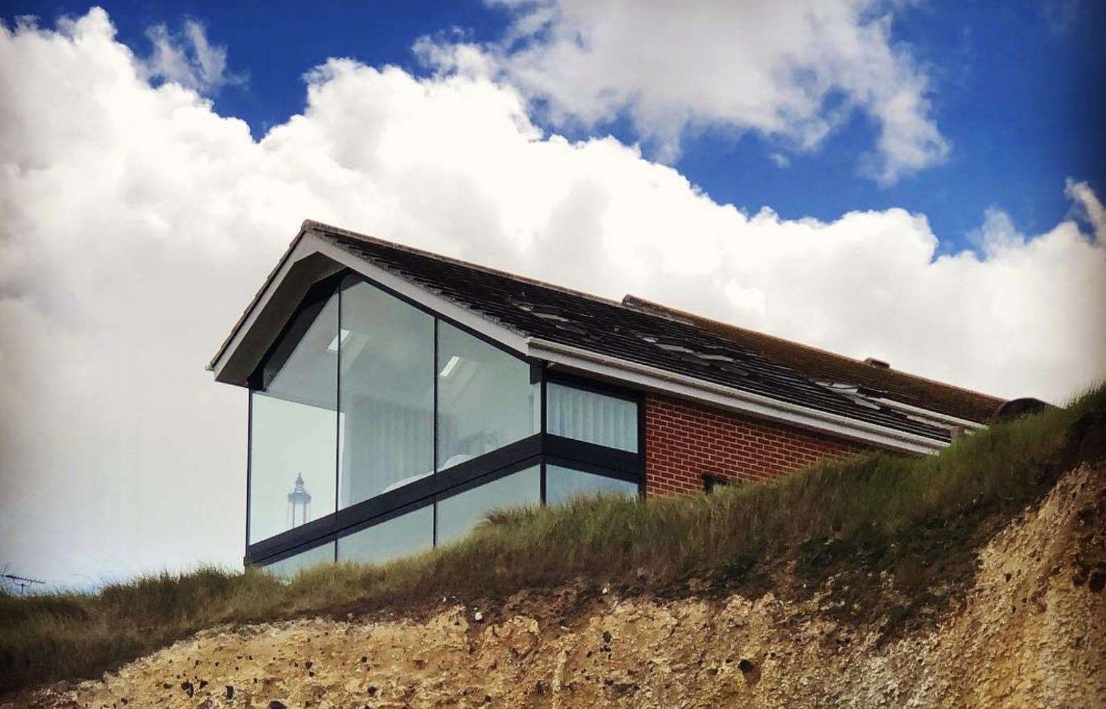 The sea-facing wall of the building is made completely of glass, offering guests "stunning" sea views. Photo: Niel Tuson