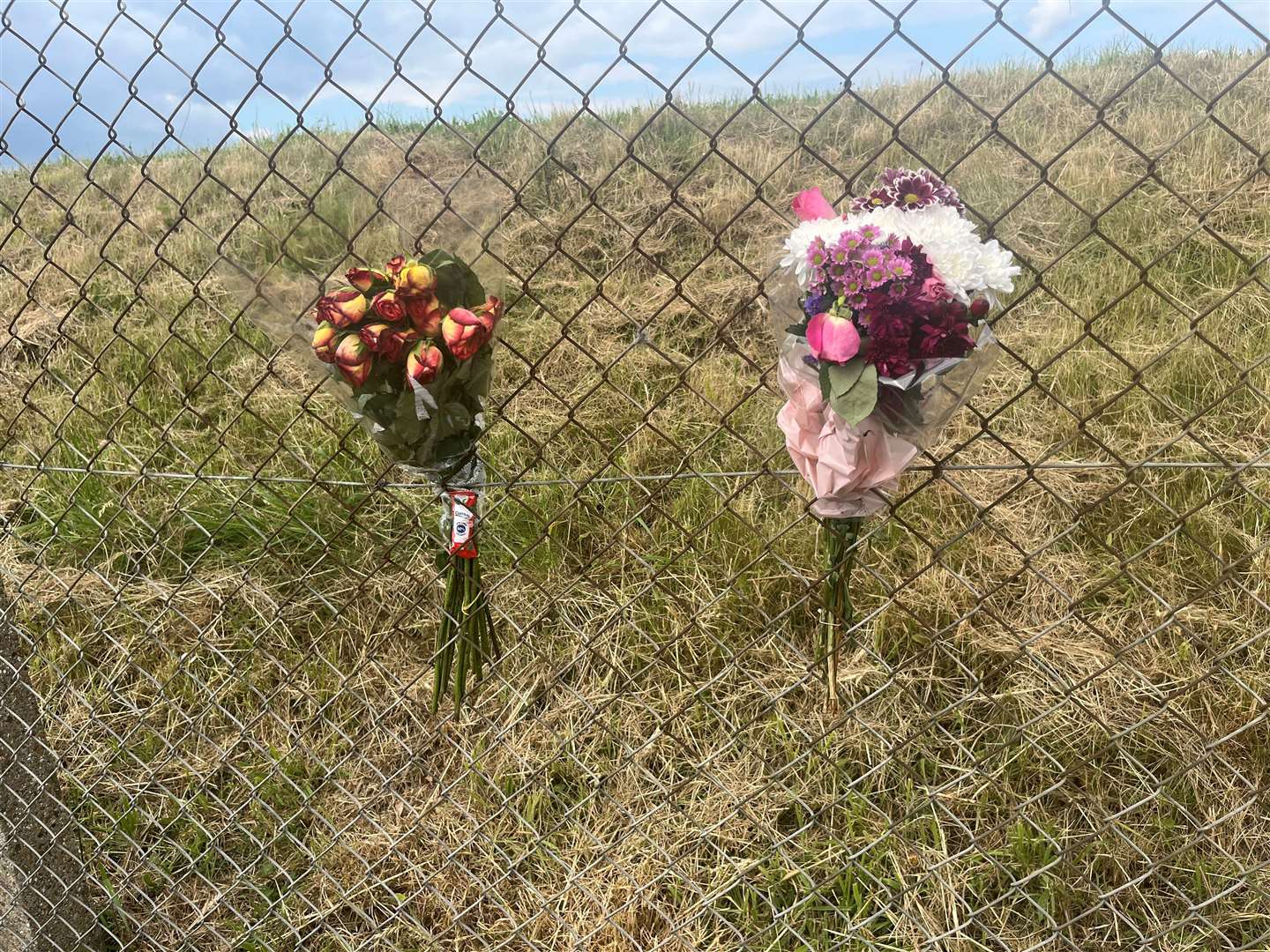 Floral tributes left at the scene of the accident