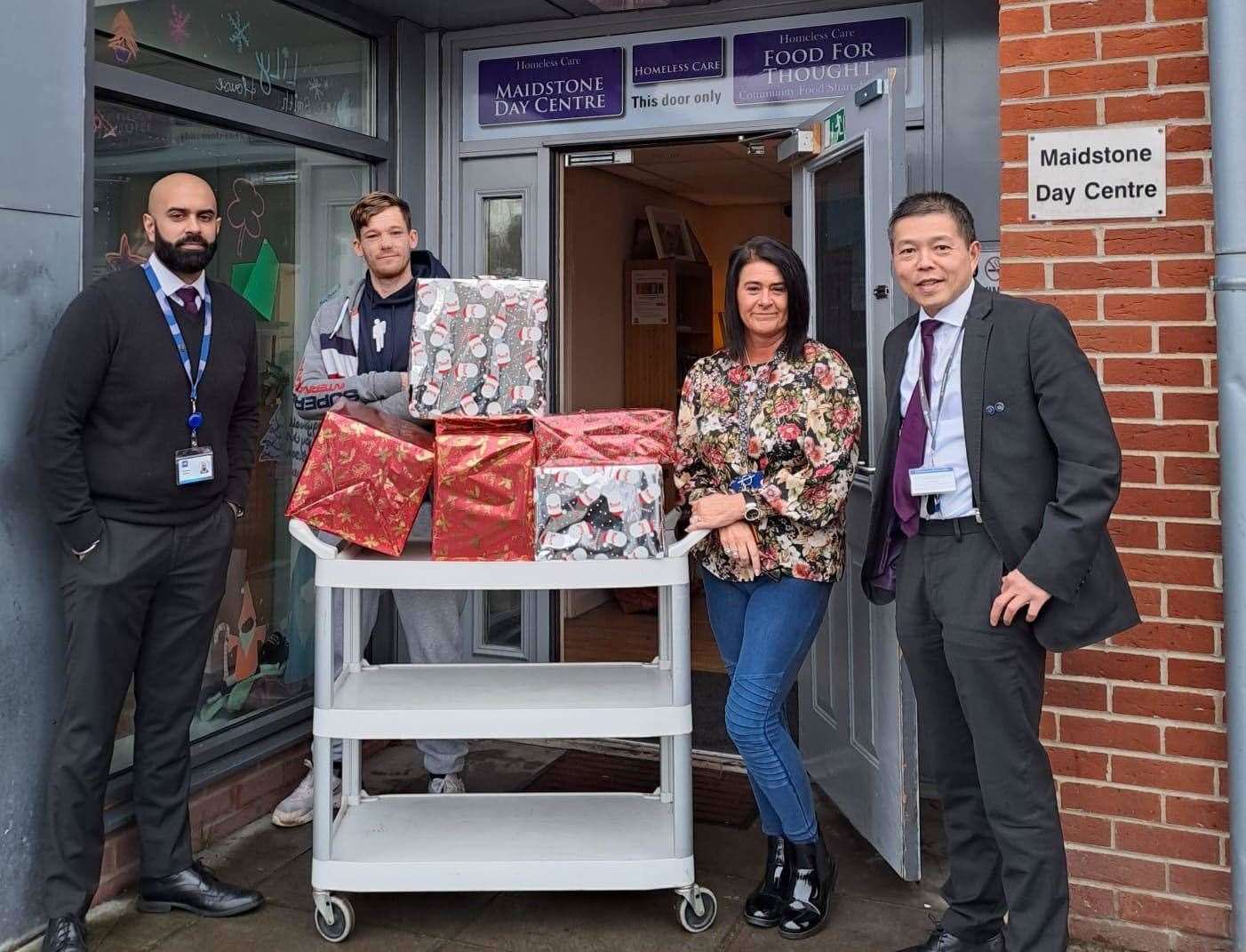 Representatives from Kent Reliance, pictured with assistant manager Tracy Maybank. Picture: Maidstone Day Centre