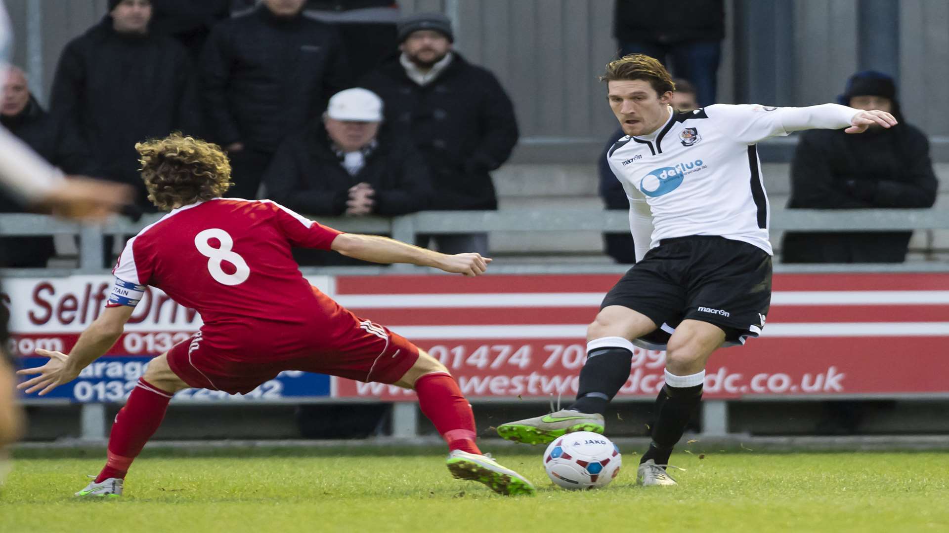 Tom Bradbrook plays a pass during Dartford's FA Trophy defeat to Whitehawk Picture: Andy Payton