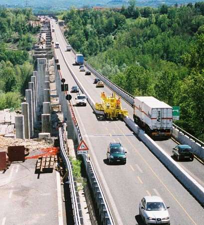 A moveable barrier being used on a road in Italy