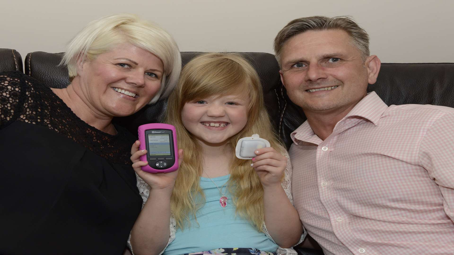 Isabella with mum Martine and Dad Mark. Picture: Paul Amos