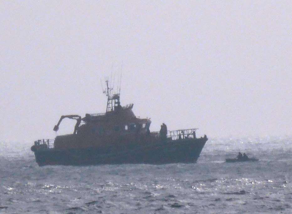 The lifeboat picks up the two men. Picture: Folkestone Coastguard