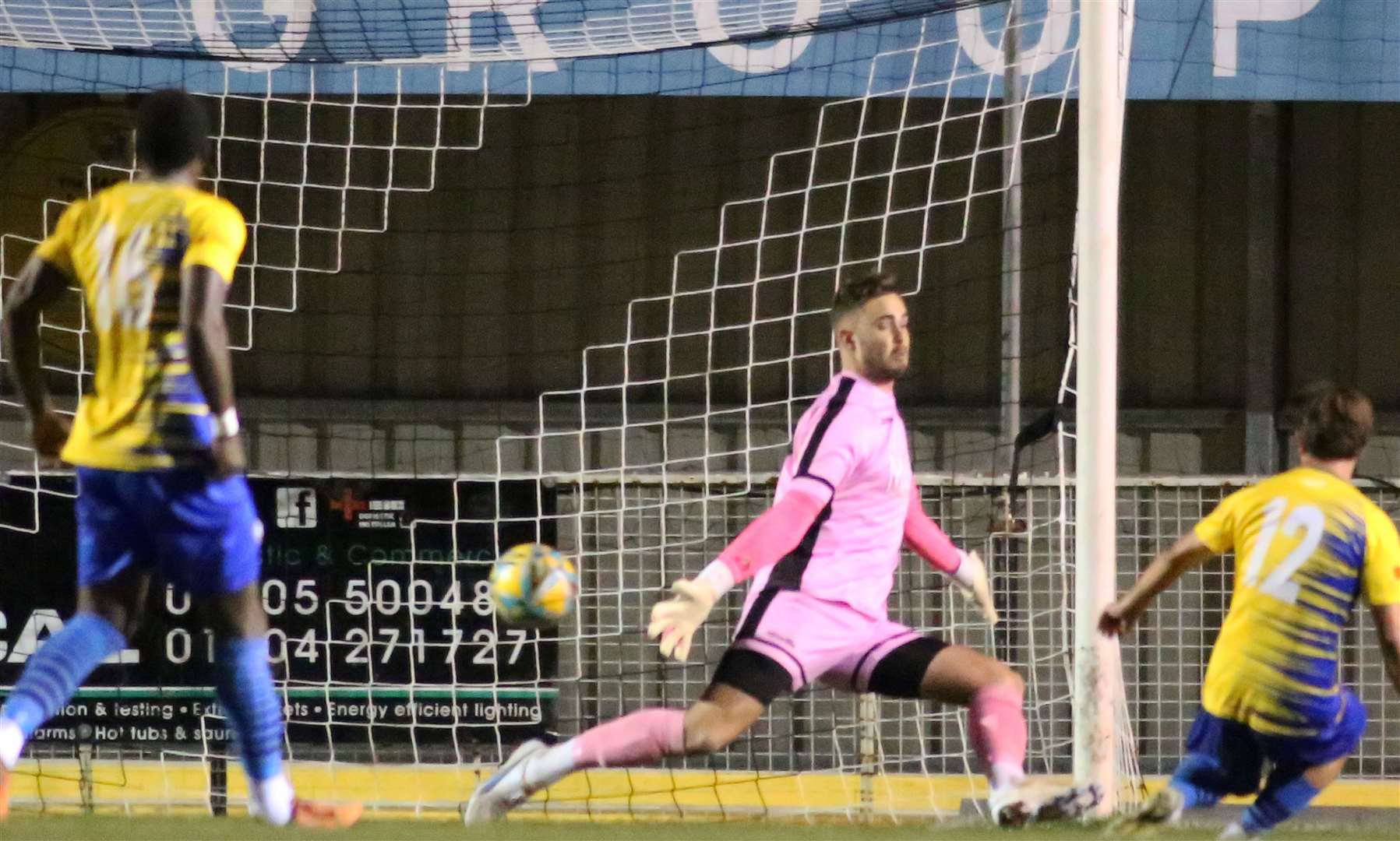 Snodland’s Connor Pring slots past Deal keeper Henry Newcombe. Picture: Paul Willmott