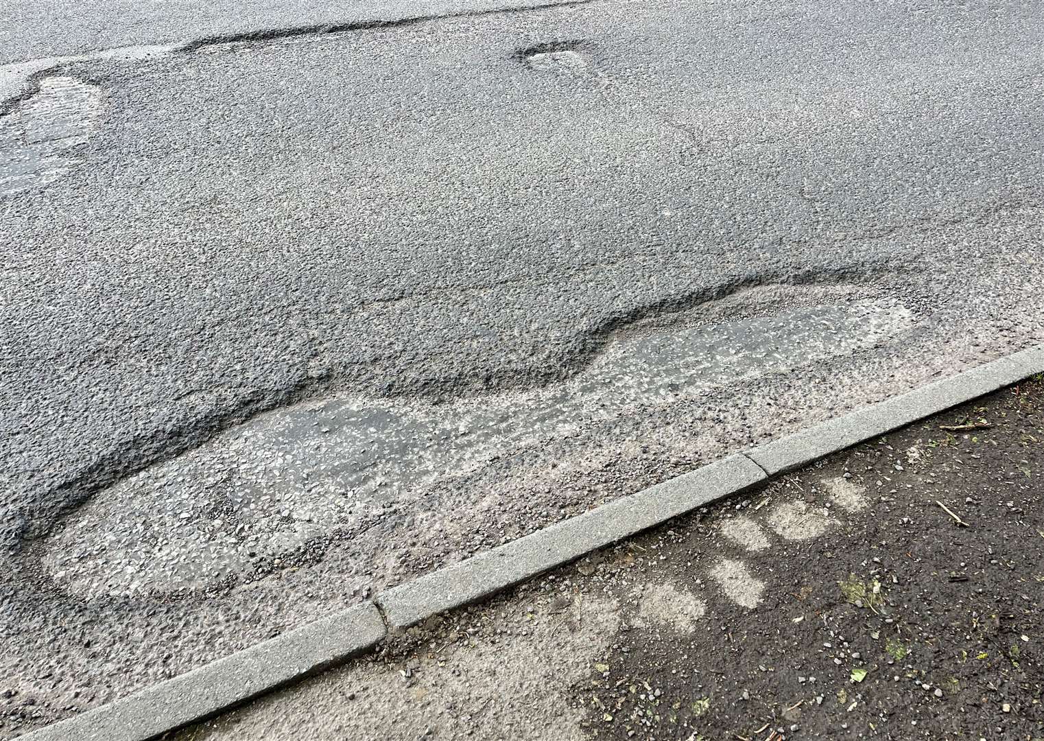 The road has been littered with potholes for years