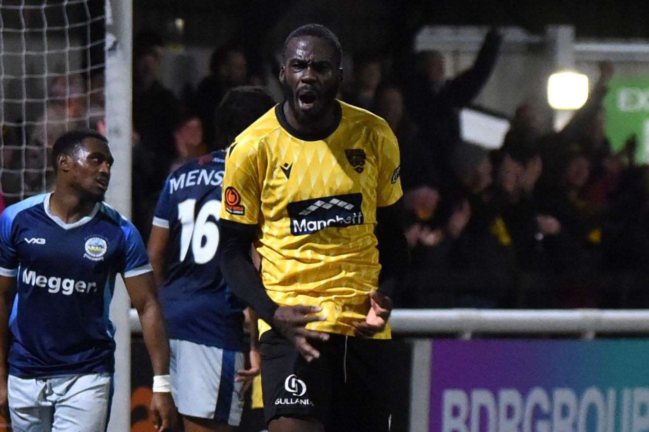 Levi Amantchi celebrates his winner against Dover. Picture: Steve Terrell