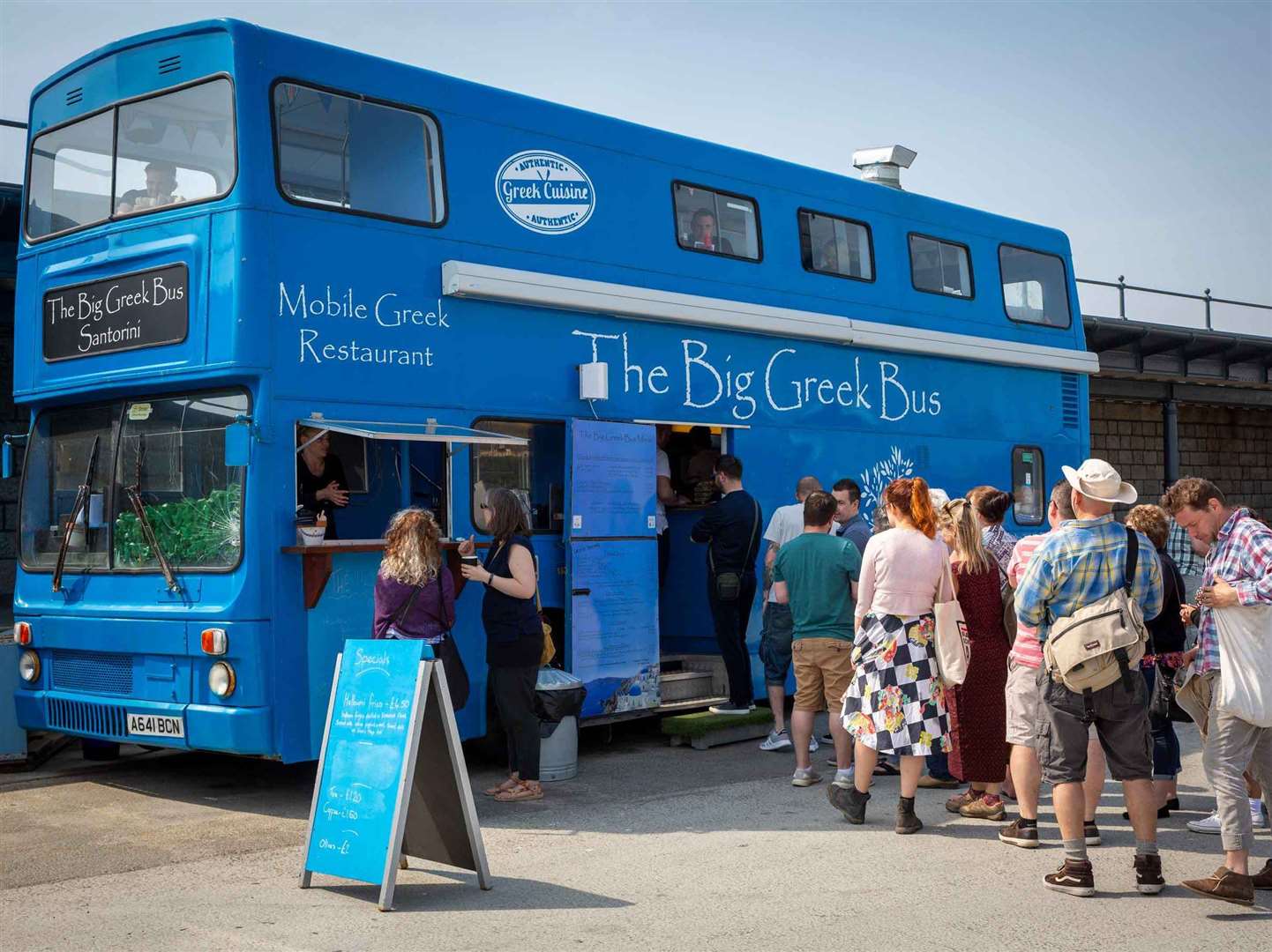 The Big Greek bus was towed away from Folkestone Harbour Arm in February. Picture: Folkestone Harbour Arm