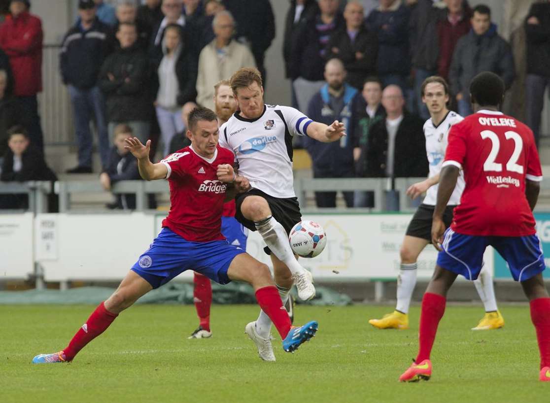 Dartford captain Elliot Bradbrook battles for possession in midfield Picture: Andy Payton