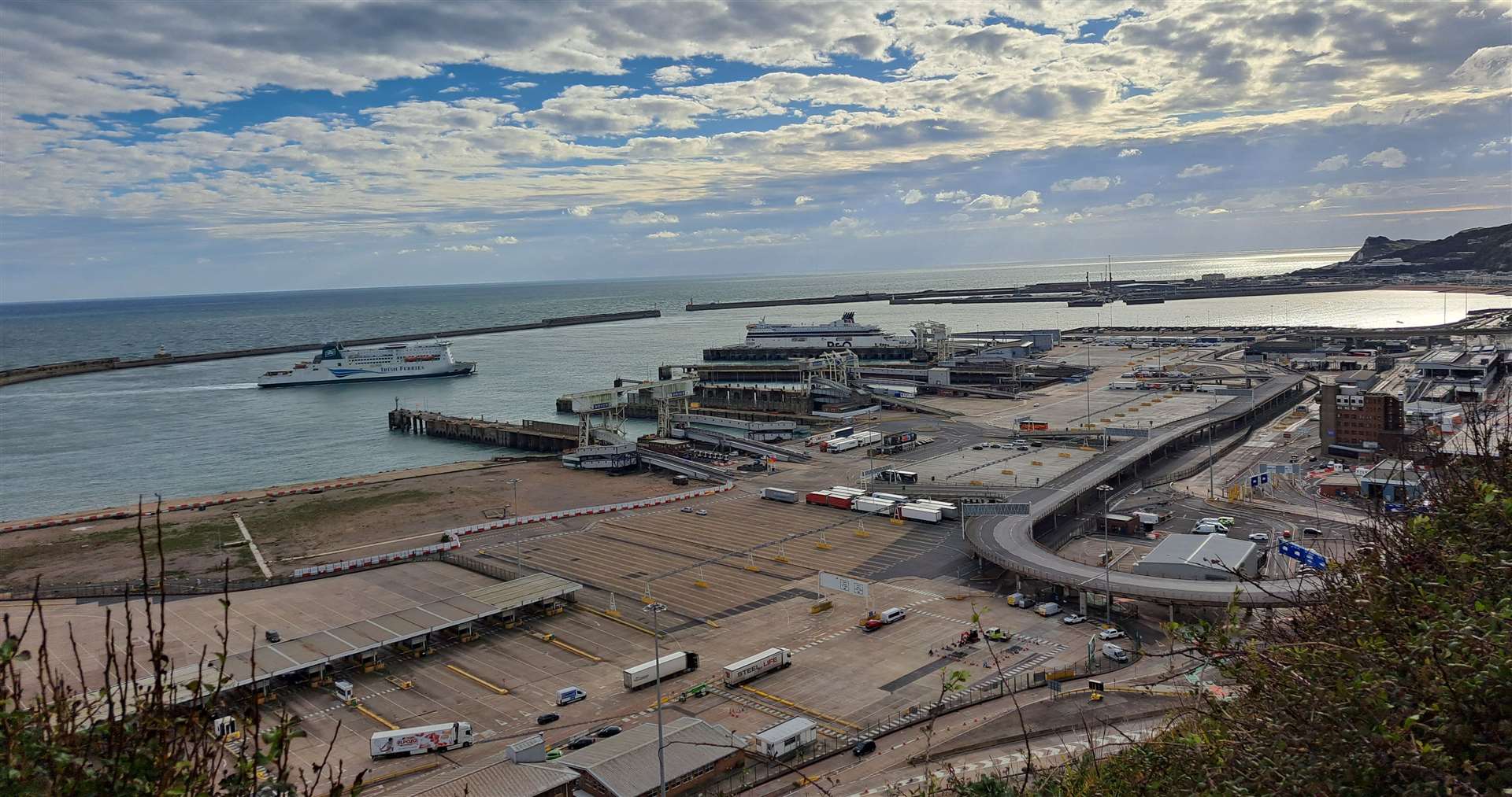 A view of the entire Dover Harbour from the White Cliffs with the Eastern Docks in the foreground