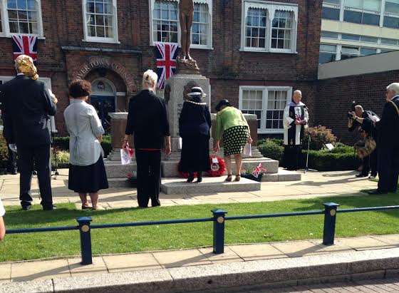 Town clerk, Allison Burton, former Mayor, Ronnie Philpott, chairman of DDC, Sue Nicholas and present Mayor Pam Brivio laying wreaths at the memorial