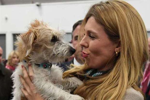 Carrie Johnson, who is head of communications at the Aspinall Foundation, pictured with her dog Dilyn (Stefan Rousseau/PA)