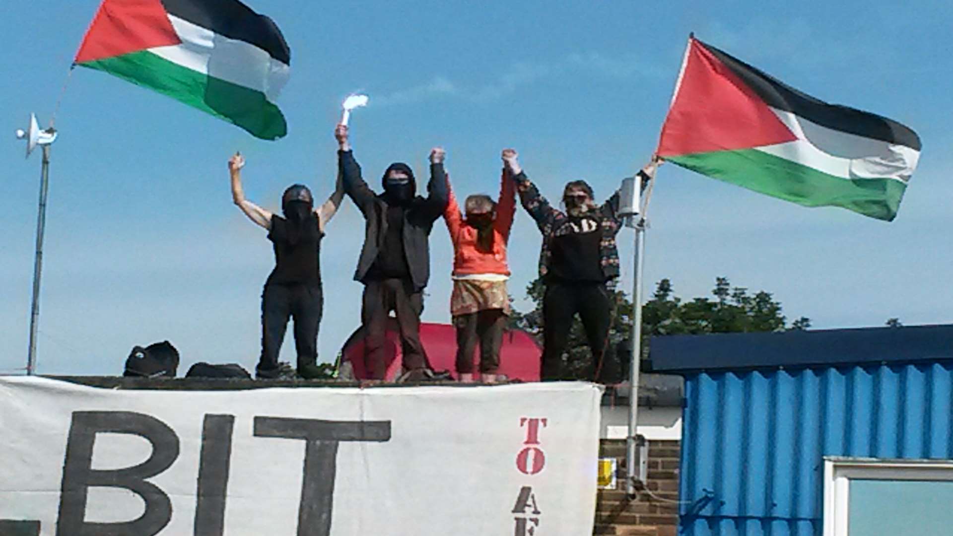 Protesters on rooftop of Instro Precision in Pysons Road industrial estate, Broadstairs