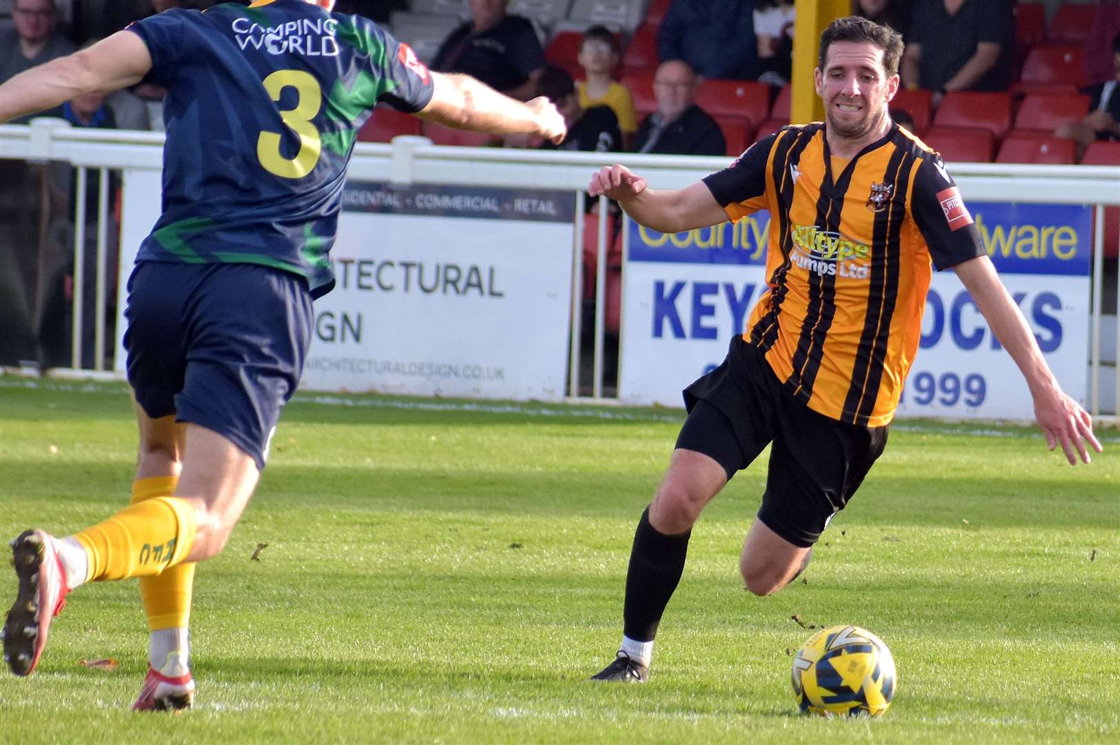 Folkestone's Ian Draycott gets stuck in. Picture: Randolph File