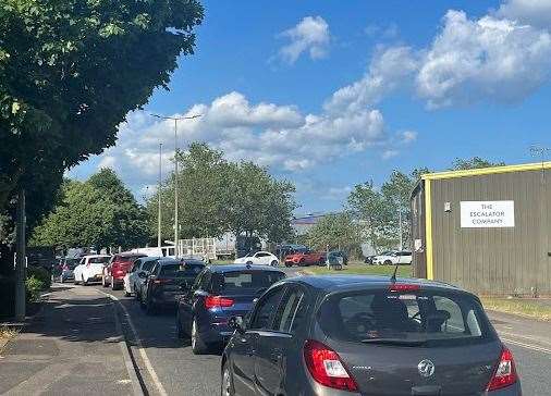 Traffic queuing in Sir Thomas Longley Road approaching the roundabout with Anthonys Way on Medway City Estate