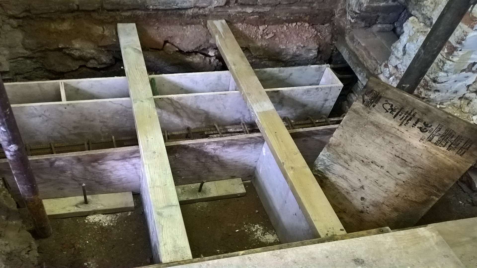 Excavation work under the floor prior to concrete being poured in. Picture: National Trust