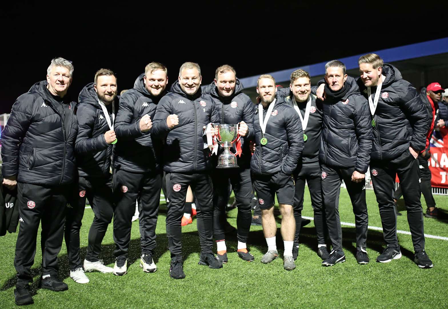 Chatham Town's management team with the Velocity Cup Picture: Max English