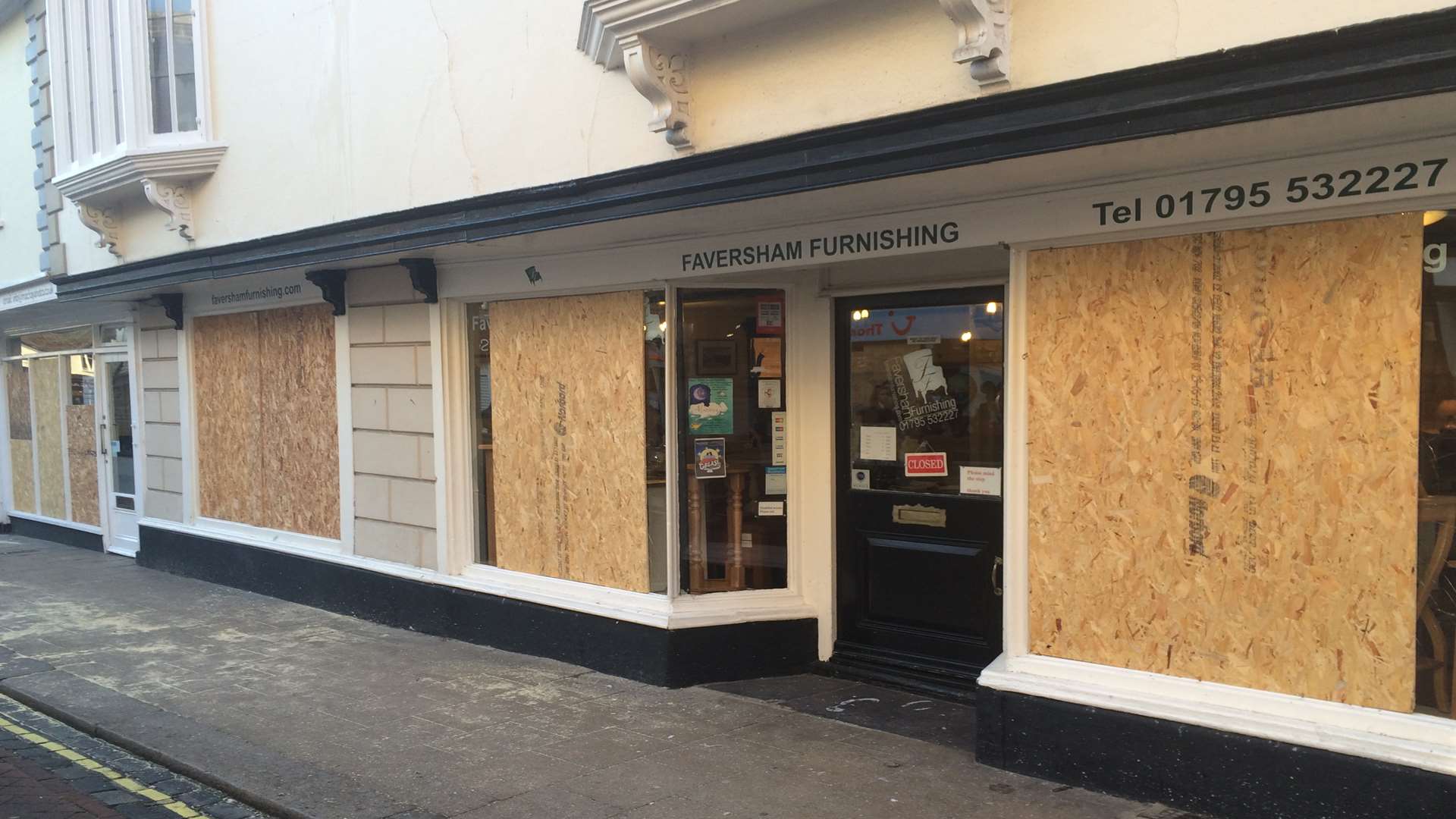 Faversham Furnishings had all of its three windows broken.