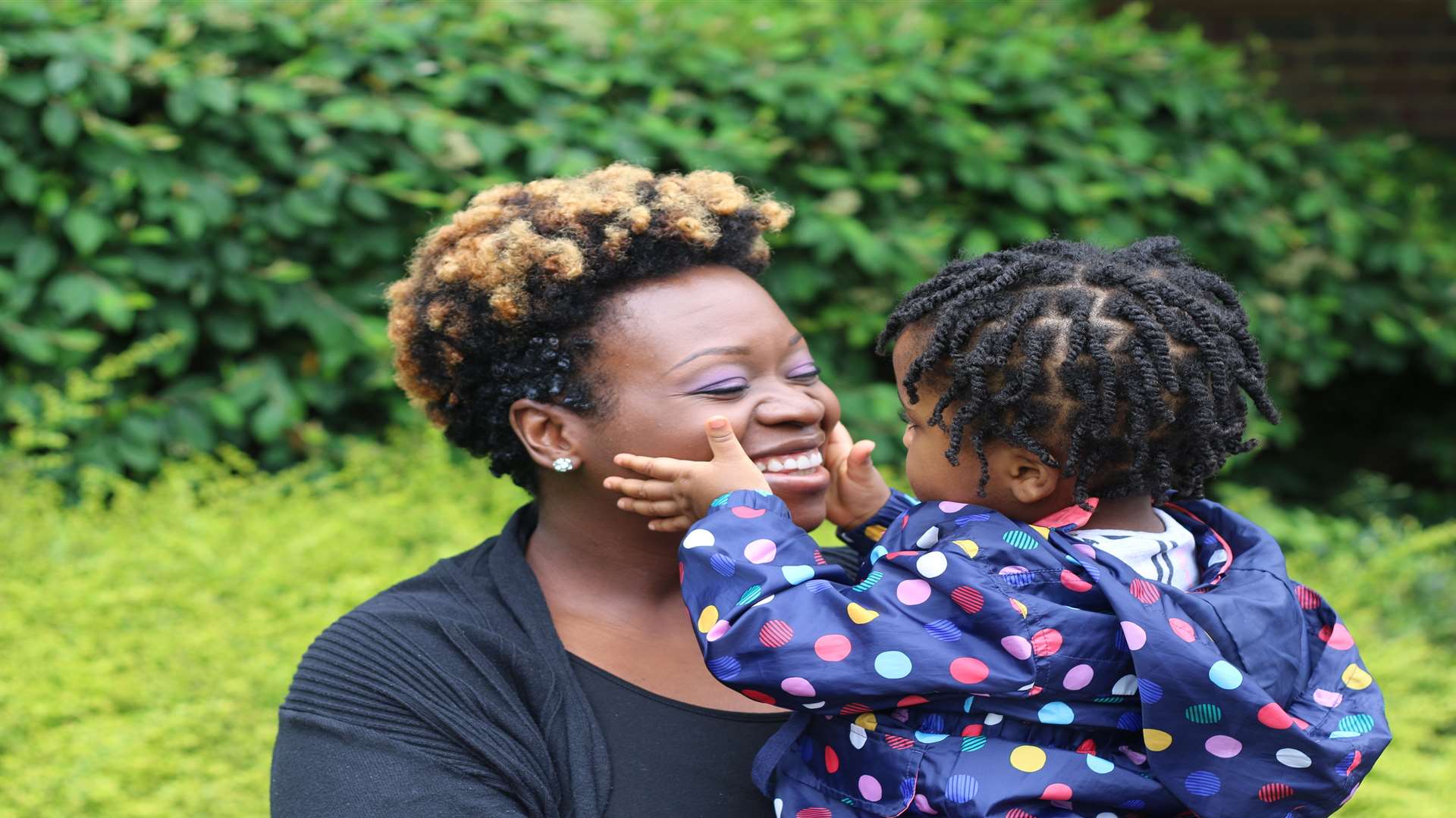 Children's author Tola Okogwu with her daughter Elizabeth