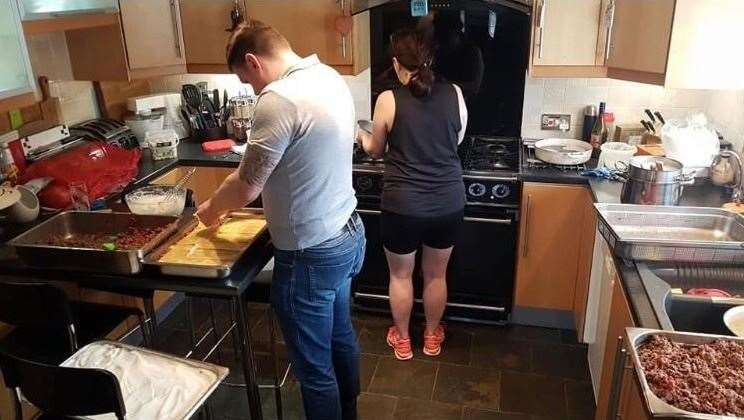 West Kingsdown residents Chris and Lorraine Wayman helping with the meal prep