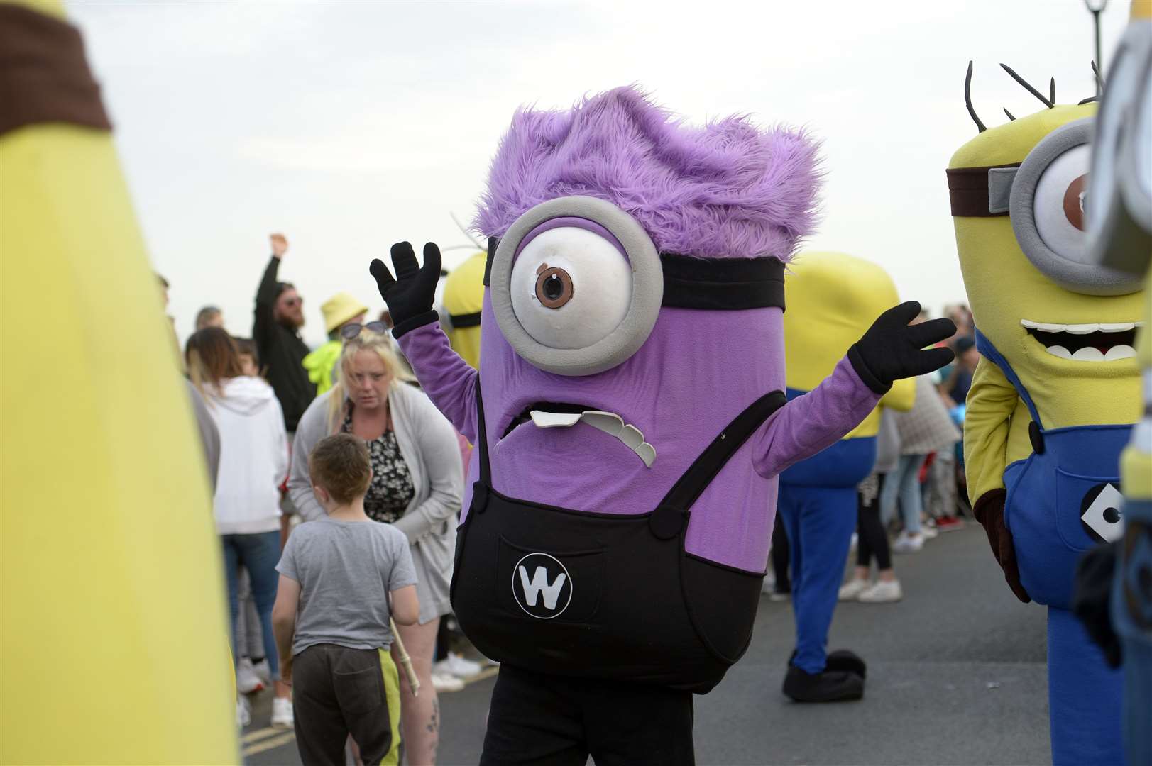 Minions offered hugs to children as they passed. Picture: Barry Goodwin