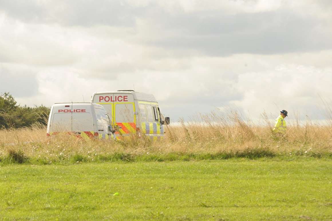 An officer searches for clues on the Great Lines. Picture: Steve Crispe