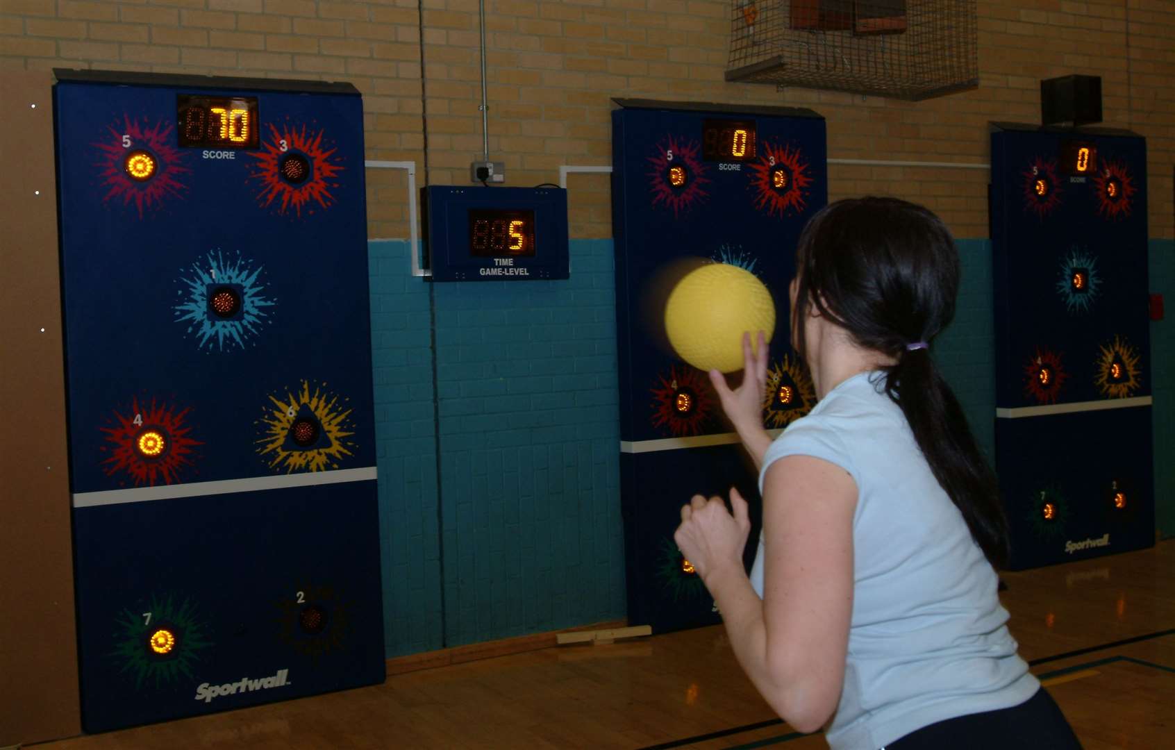 Former KM reporter Jane Barlow trying out the interactive sports wall at the centre