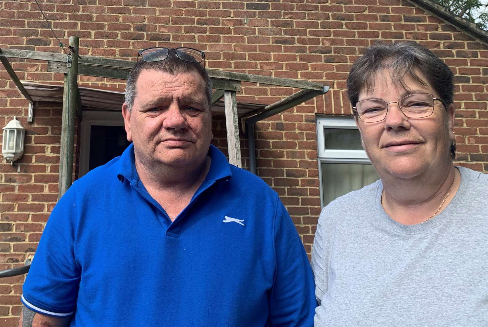 Ashford Borough Council will not let Rob Pollock, pictured with sister Tracey Seber, move into his late father's bungalow in Charing