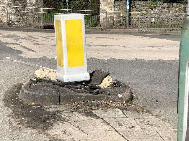 A broken bollard near the development site