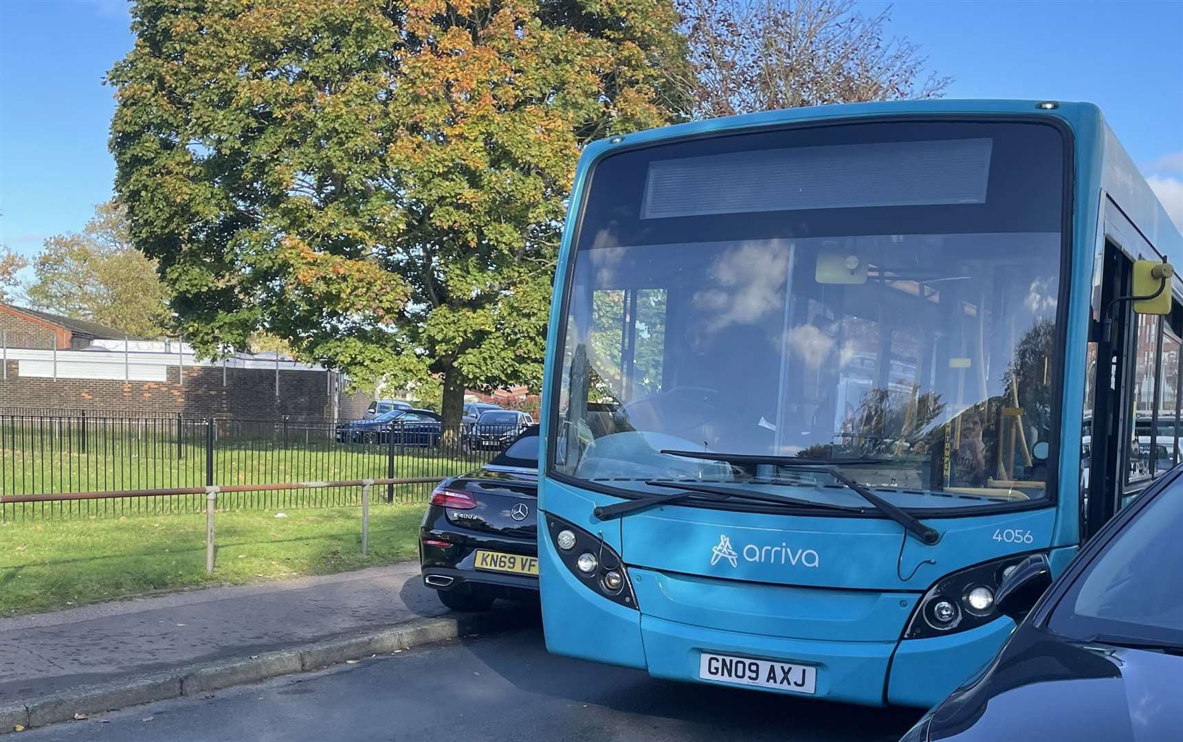 A bus got stuck due to the volume of traffic which has arrived for the funerals