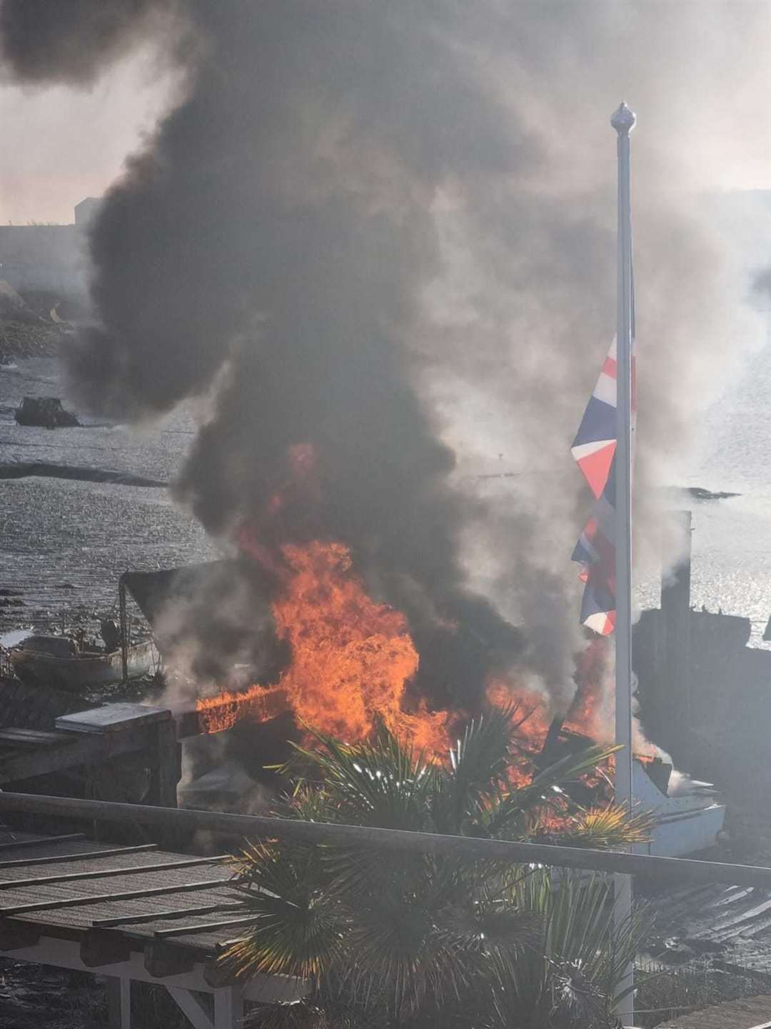 Fire on boat on River Medway off Canal Road, Strood