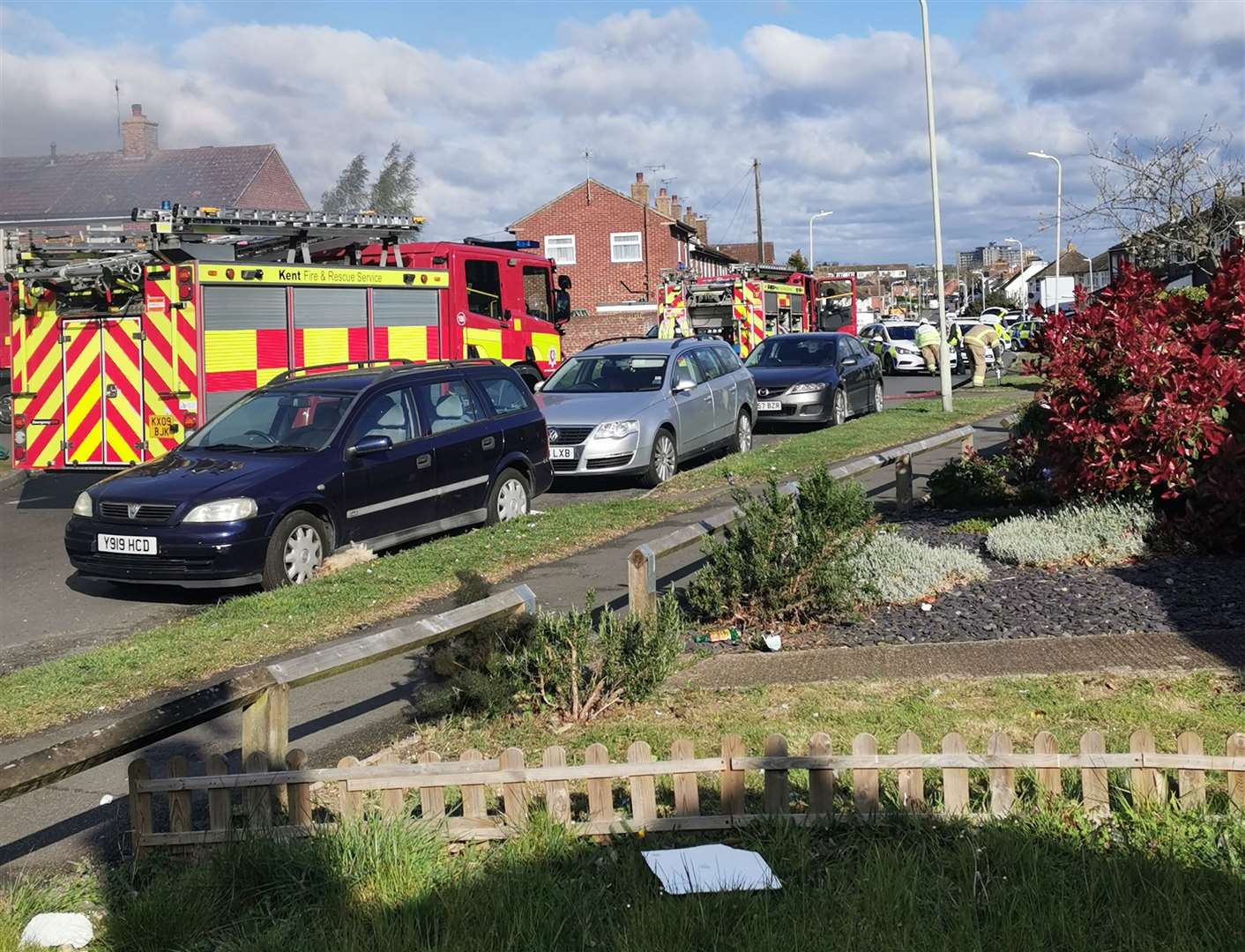 A flood of emergency service vehicles arrived quickly at the scene, working to rescue people trapped in the rubble