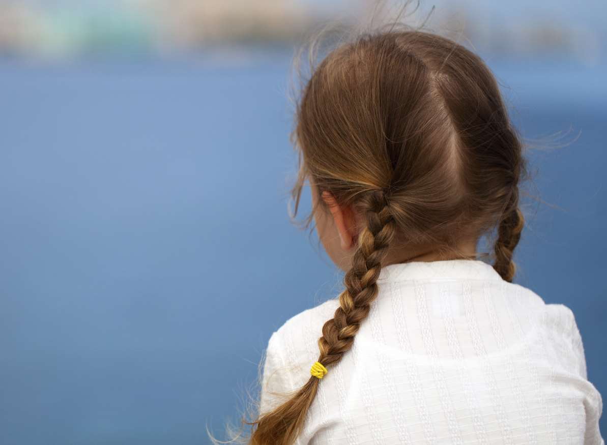 The girl was found in the street. Stock image, posed by model.