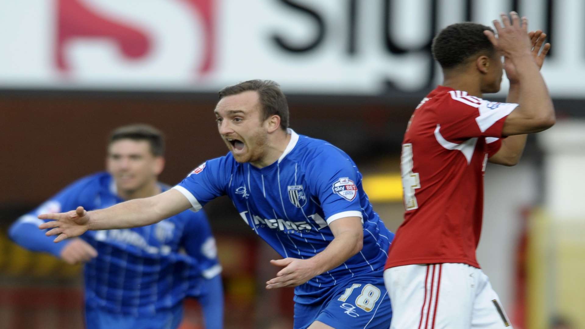 Charlie Lee celebrates scoring for Gillingham at Bristol City in 2014 Picture: Barry Goodwin