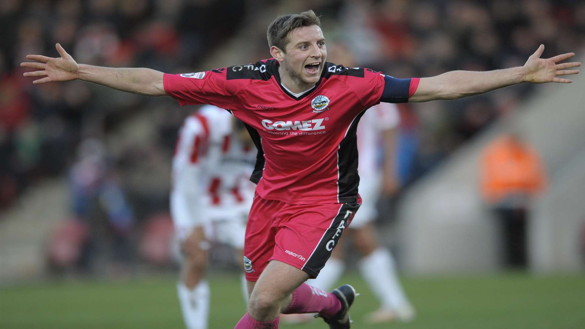 Connor Essam wheels away after scoring for Dover at Cheltenham. Picture: Ady Kerry.