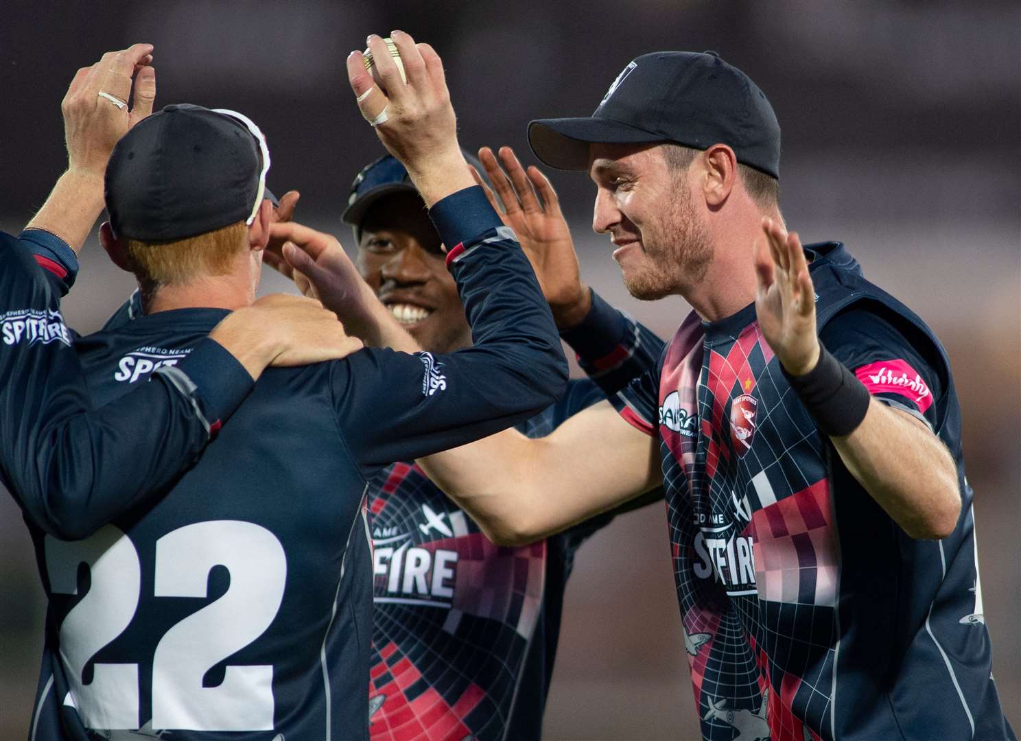 Kent's Jordan Cox is greeted by skipper Daniel Bell-Drummond after catching Somerset's Peter Trego on the boundary. Picture: Ady Kerry