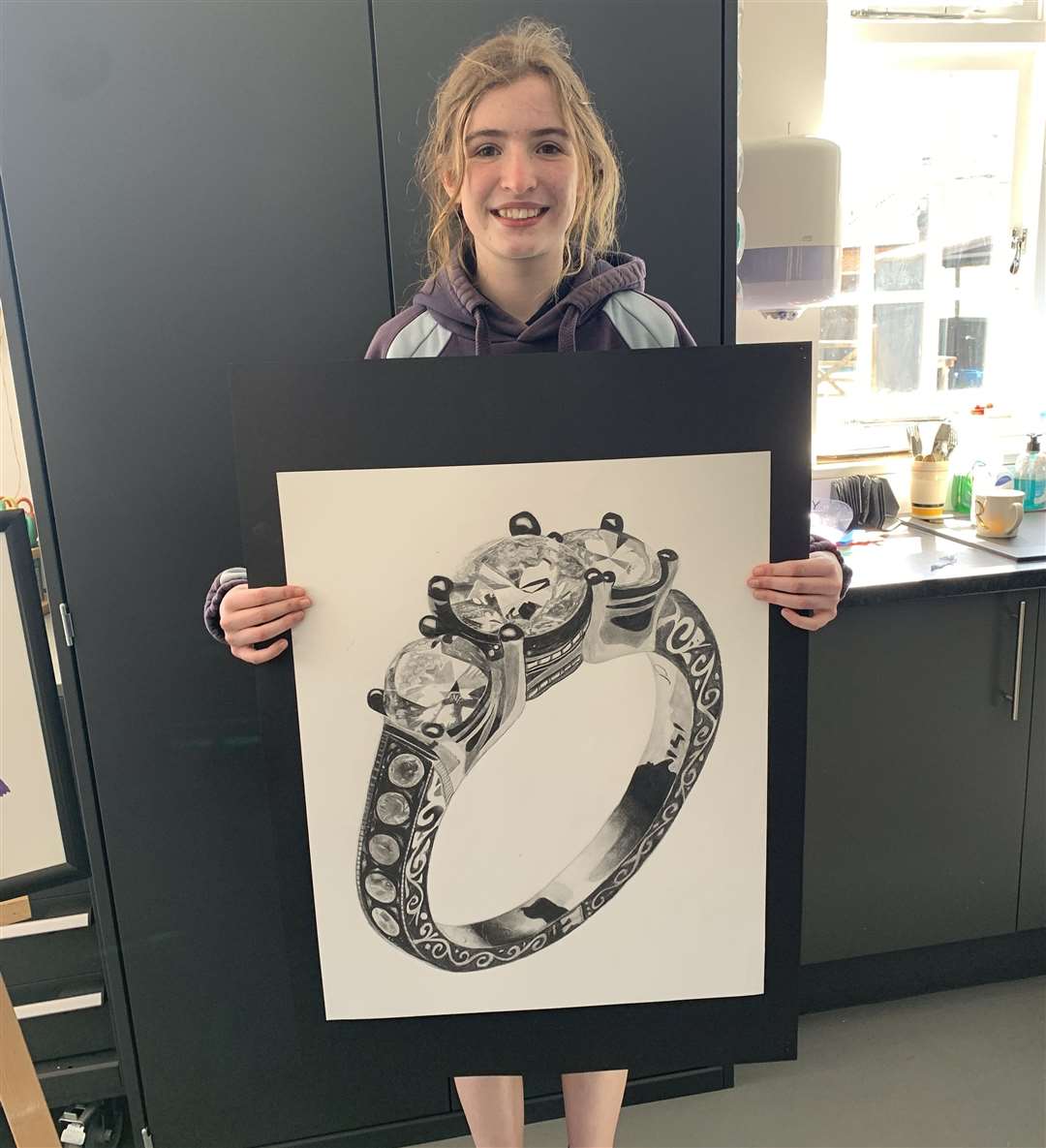 Sasha Llewellyn, 12, with her work