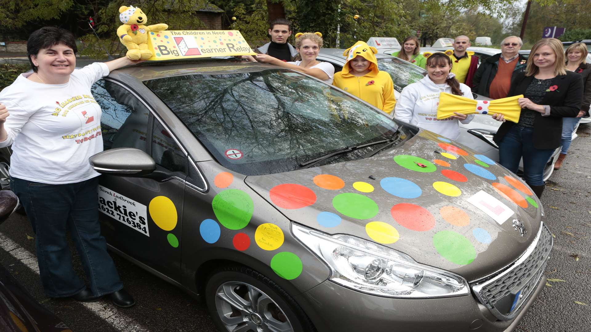 Sarah Ladbrook and Wendy O'Kill with the brightly decorated learner car in aid of Children in Need