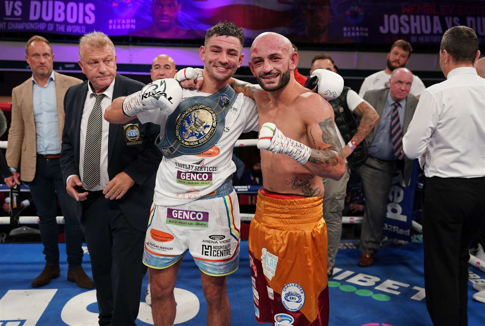 Sam Noakes with opponent Gianluca Ceglia after retaining his European lightweight title. Picture: Stephen Dunkley / Queensberry Promotions