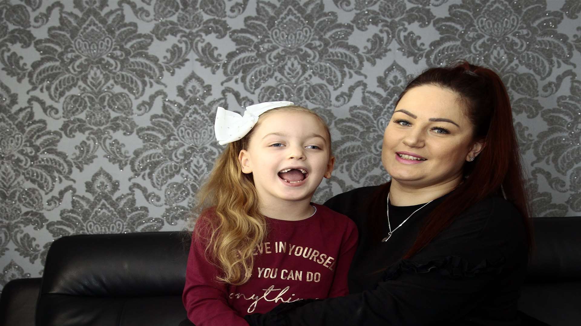 Lily-Mae Leadsham 5, just returned from hospital after spinal surgery to help her walk, also pictured with her mum Kerry at their home in Ringlestone, Maidstone.