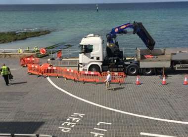 Work is carried out to install the statue