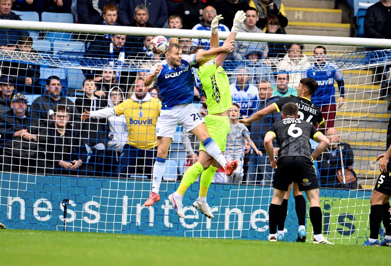 Elliott Nevitt gets up for the ball on another frustrating afternoon Picture: Barry Goodwin