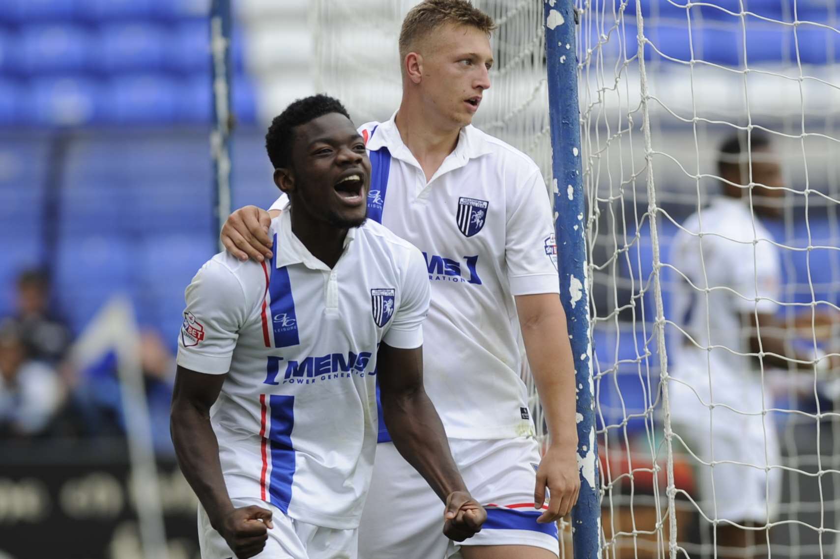 Gills' Adedeji Oshilaja celebrates his goal with Luke Norris Picture: Barry Goodwin