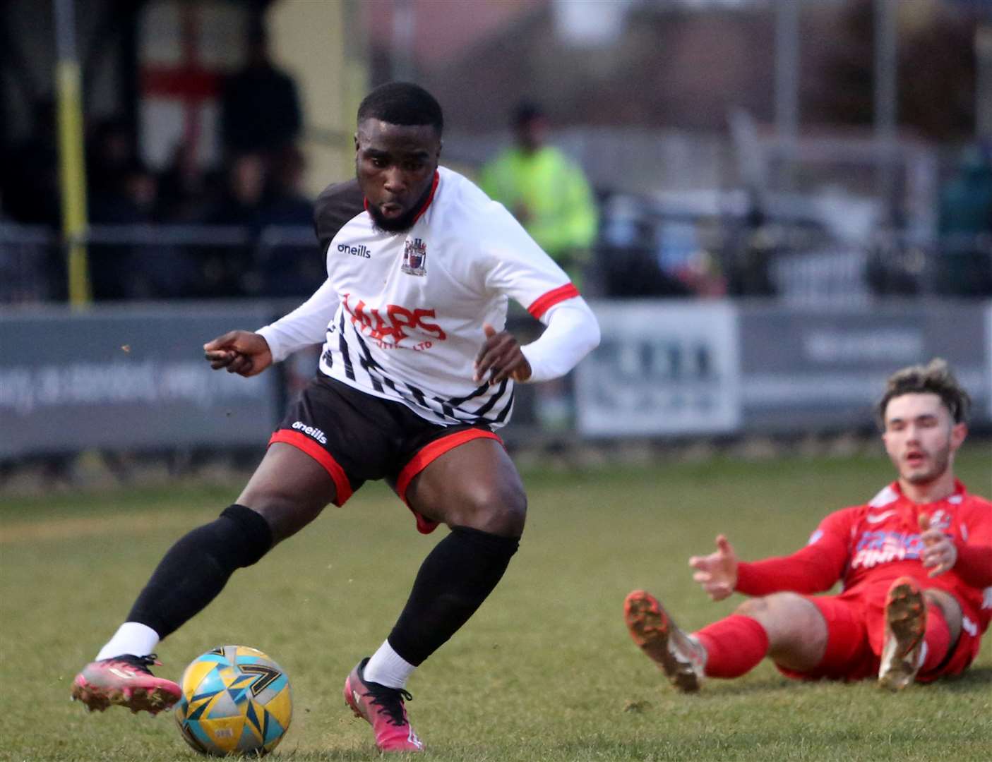 Deal defender Ife Oni leaves Tunbridge Wells' Matt Astle on the deck. Picture: Paul Willmott