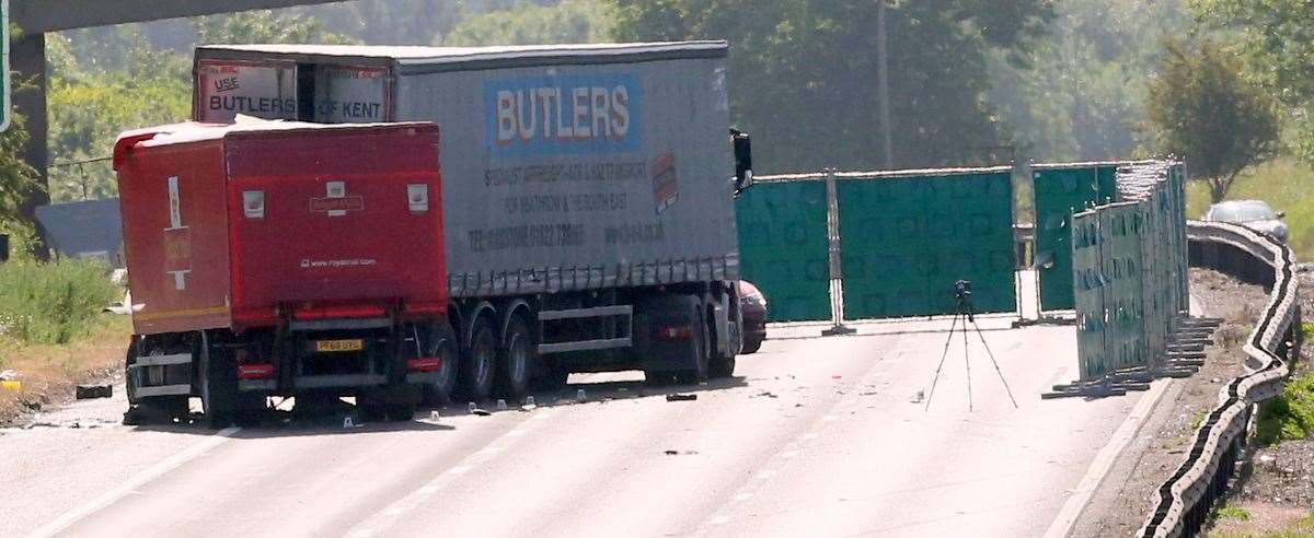 Crash investigators on the A2 near Dartford where two lorries collided. Picture: UKNIP